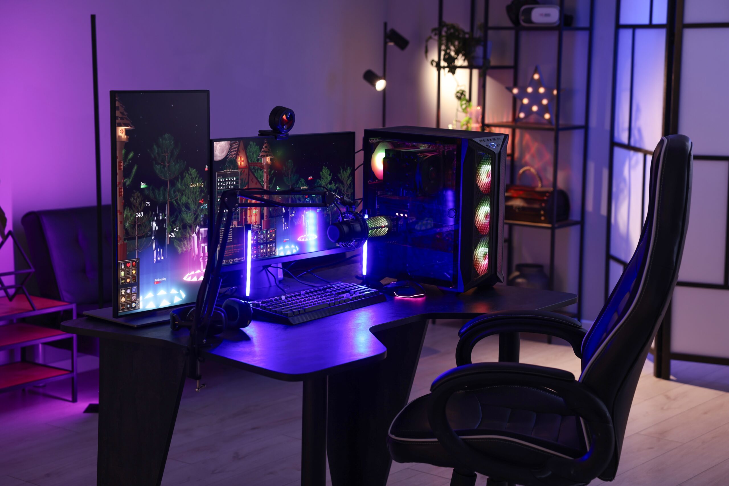 Digital media studio setup with computers, microphones, and creative tools.